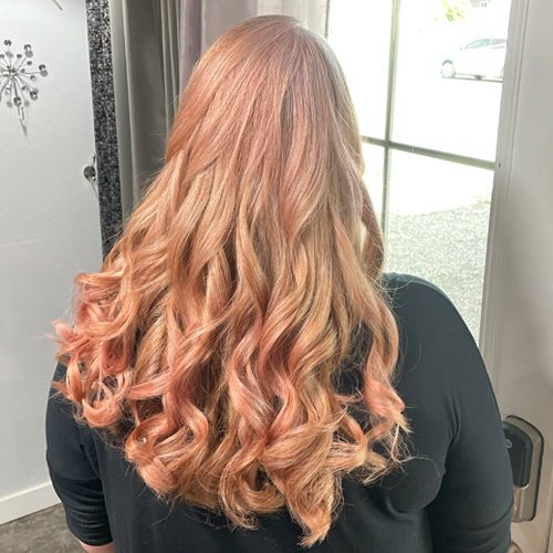 After color correction hair color is a beautiful rose color.